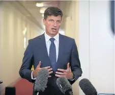  ??  ?? POWER PLAY: Energy Minister Angus Taylor says electric cars would cost more under a Labor government.