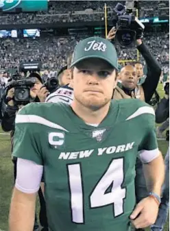  ?? AP ?? As if life on the field is not hard enough for Sam Darnold, he also has to deal with ESPN’s radio crew mocking him after interviews.