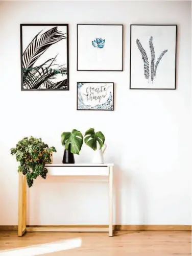  ?? SHUTTERSTO­CK ?? A gallery wall can show off your style and add depth to your space.