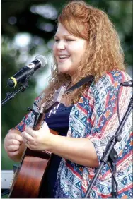  ?? Photo by Randy Moll ?? Kaitlin Carlson is local talent. She lives and works in the Gentry area and has entertaine­d festival goers before with her songs and music.