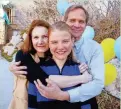  ?? AP ?? Elizabeth Smart poses with her parents, Lois and Ed, on March 13, 2003, a day after she was found alive after a nine-month kidnapping ordeal.