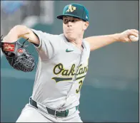  ?? Michael Ainsworth The Associated Press ?? J.P. Sears (1-1) blanked Texas on one hit and three walks over 6⅓ innings Thursday during the Athletics’ 1-0 triumph at Globe Life Field.