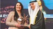  ??  ?? WAM Shaikh Hazza Bin Zayed Al Nahyan, Deputy Chairman of the Abu Dhabi Executive Council, honours Sonya Ryan.
