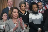  ?? SARAH SILBIGER — THE NEW YORK TIMES ?? House Speaker Nancy Pelosi stands in front of government employees out of work because of the shutdown on Capitol Hill on Wednesday.