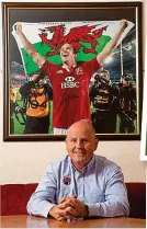  ?? HUW EVANS ?? Pictures: first coach Kevin Brooks with a framed photo and Jones at Bonymaen (above)