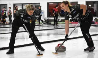  ?? Photo by Matthew Liebenberg/Prairie Post ?? LOCAL STARS: Swift Current Curling Club hosted the RBC Dominion Securities Western Showdown, Oct. 13-16. Swift Current curler Kelly Schafer (at left) played with Winnipeg's Team Abby Ackland at the Women's Western Showdown. She is pictured sweeping a stone with teammate Sara Oliver. For more, see Page 18.