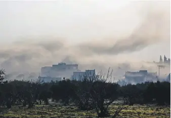  ?? AFP ?? The town of Al Nayrab in Idlib after it was hit by a pro-regime air strike on Tuesday