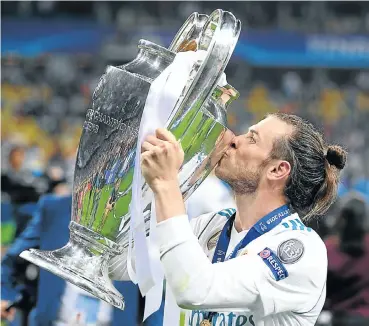  ?? Picture: Reuters ?? Real Madrid’s Gareth Bale celebrates winning the Champions League against Liverpool in Kiev last night.