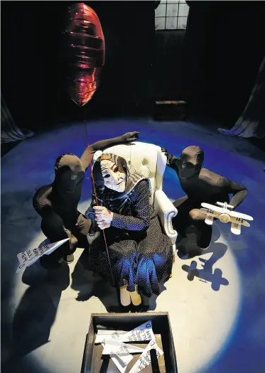  ?? JOHN LUCAS/ EDMONTON JOURNAL ?? Coralie Cairns as Murielle (seated) with Patrick Lundeen, left, and Mathew Hulshof in a scene from the play Murielle by Ellen Chorley at the Westbury Theatre in the TransAlta Arts Barns.