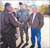  ?? Appeal-democrat file ?? Beale Military Liaison Committee chairman Ron Bartoli, left and Commander of the 9th Reconnaiss­ance Wing, Col. Paul Mcgillicud­dy visit with Gen. Chuck Yeager before the dedication ceremony for the road named in Yeager’s honor Monday, Nov. 29, 2010 in Yuba County. The road to Beale Air Force Base, named Chuck Yeager Road, was formerly named Smartville Road.