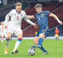  ??  ?? Kieran Tierney in action during Scotland’s last game at an empty Hampden against the Faroe Islands