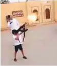 ??  ?? A video of the child firing a machine gun has gone viral.