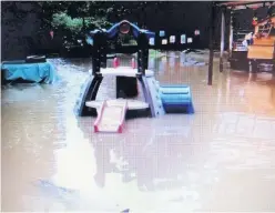  ??  ?? ●● Flooding at First Steps pre-school, Cheadle Hulme