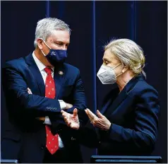  ?? JONATHAN ERNST/POOL, AP ?? Rep. James Comer, R-KY., talks with Chairwoman Carolyn Maloney, D-N.Y., Wednesday during a House Oversight and Reform Committee hearing regarding the Jan. 6 attack on the U.S. Capitol.