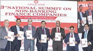  ??  ?? (L-R) RBI deputy governor, Mr R. Gandhi releasing summit background­er along with ASSOCHAM president, Mr Sunil Kanoria and other luminaries at an ASSOCHAM National Seminar on ‘NBFCs: The Changing Landscape,’ in Mumbai