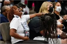  ?? AP Photo/Ge rry Broome ?? Family members react during the funeral for Andrew Brown Jr., on Monday at Fountain of Life Church in Elizabeth City, N.C.