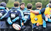  ?? ?? Calling shots: Ian Peel (left) holds court during an England training session in 2013; and (right) at ease with his choice