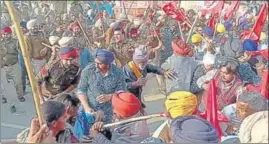  ?? HT PHOTO ?? Police lathi-charge farm labourers protesting outside Punjab CM Bhagwant Mann’s residence in Sangrur on Wednesday