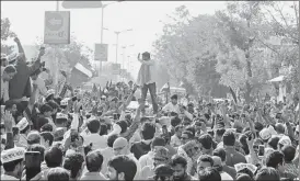  ?? HT PHOTO ?? Patidar Anamat Andolan Samiti convener Hardik Patel at a roadshow in Ahmedabad, Gujarat, on Monday. The roadshow did not have clearance from administra­tion.