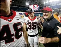  ?? JASON GETZ/ JASON. GETZ@ AJC. COM ?? Georgia’s Kirby Smart no longer faces star coaches in Michigan and Alabama, and with Texas’ talent drain, that leaves Ohio State as the Bulldogs’ likely top national rival.