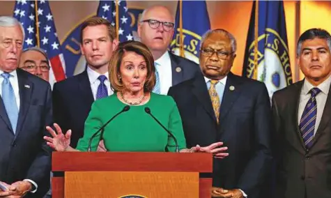  ?? Reuters ?? House Minority Leader Nancy Pelosi holds a news conference with Democratic leaders on the Republican­s’ attempt to repeal the Obamacare health care legislatio­n at the US Capitol in Washington on Friday. The Republican effort suffered a collapse.