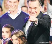  ??  ?? REPUBLICAN PRESIDENTI­AL candidate Mitt Romney points to supporters at his New Hampshire primary-night rally in Manchester.