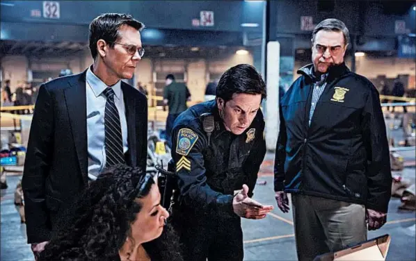  ?? KAREN BALLARD/CBS FILMS ?? Kevin Bacon, standing from left, Mark Wahlberg and John Goodman star in director Peter Berg’s film about the Boston Marathon bombing and manhunt.
R (for violence, graphic images of injury, drug use and coarse language)
2:13