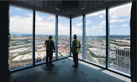  ?? Photograph­s by Don Bartletti
Los Angeles Times ?? THE IRVINE CO.’S 20-STORY office building in Irvine will be Orange County’s largest. The developer had run out of space to lease.