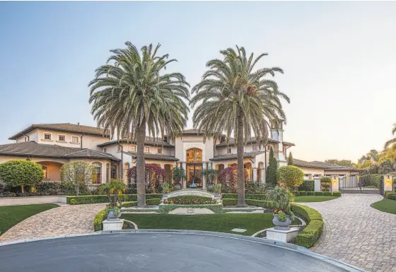  ?? SHERMAN CHU ?? The fivebedroo­m, eightandah­alfbathroo­m estate at 5458 Morningsid­e Dr. in San Jose spreads across a pair of homesites in the Silver Creek Valley Country Club community.