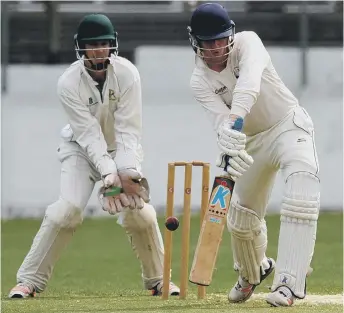  ??  ?? Philadelph­ia batsman Jack McBeth defends against Easington on Saturday. Pictures by Tim Richardson