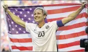  ?? ELAINE THOMPSON / ASSOCIATED PRESS ?? Abby Wambach (celebratin­g this year’s U.S. World Cup championsh­ip) and her teammates were honored Tuesday at the White House.