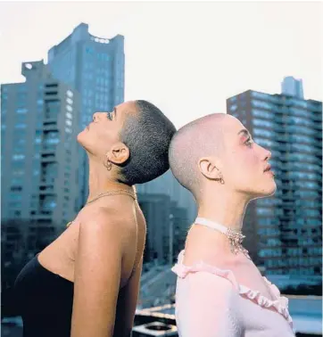  ?? OK MCCAUSLAND/THE NEW YORK TIMES ?? Rita Melssen, left, and Clara Perlmutter on March 18 in New York. There’s plenty of evidence that the shaved head is the first trendy cut of 2022.