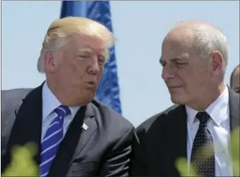  ?? SUSAN WALSH — THE ASSOCIATED PRESS ?? In this file photo, President Donald Trump talks with Homeland Security Secretary John Kelly during commenceme­nt exercises at the U.S. Coast Guard Academy in New London, Conn. Trump named Kelly as his new Chief of Staff on Friday ousting Reince Priebus.