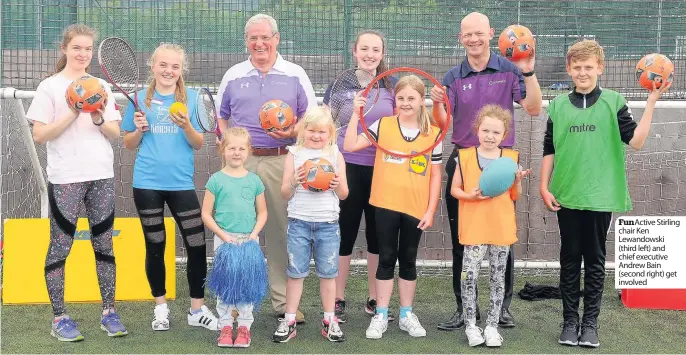  ??  ?? Fun Active Stirling chair Ken Lewandowsk­i (third left) and chief executive Andrew Bain (second right) get involved