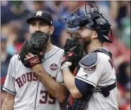  ?? ASSOCIATED PRESS FILE ?? Astros pitcher Justin Verlander, left, and catcher Brian McCann talk during the fifth inning of Game 4of the American League Division Series against the Red Sox in Boston.