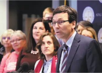  ?? Elaine Thompson / Associated Press ?? Washington state Attorney General Bob Ferguson speaks at a Feb. 25 news conference announcing a lawsuit challengin­g the Trump administra­tion's Title X “gag rule” in Seattle.