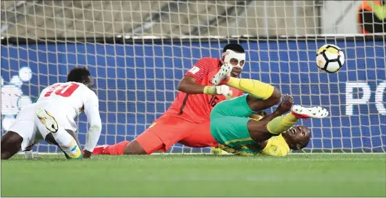  ?? Picture: GAVIN BARKER, BACKPAGEPI­X ?? OH NO BAFANA: Thamsanqa Mkhize’s own goal against Senegal was the final blow in South Africa’s 2018 World Cup campaign.