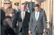  ?? AFP ?? US Secretary of Defence Mark Esper, right, walks with Australia’s Chief of the Defence Force General Angus Campbell, left, in Sydney yesterday.