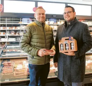  ?? ?? Die Geschäftsf­ührer Stefan (links) und Christian (rechts) Stöckle freuen sich bei der Einweihung ihres Projekts.