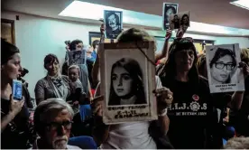  ??  ?? Relatives of people disappeare­d during Argentina’s dictatorsh­ip during a court hearing in Buenos Aires in 2017. Photograph: Javier Gonzalez Toledo/AFP/Getty Images