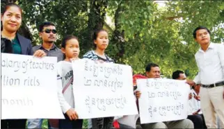  ?? PHA LINA ?? CITA members gather to demand an increase in salaries at a protest yesterday in Phnom Penh.