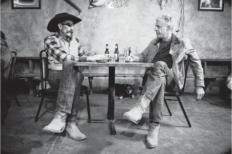  ?? Photos by Jessica Lutz / IWMF fellow Adelante Reporting Initiative ?? In Marfa, Ty Mitchell, owner of the goat-friendly Lost Horse Saloon, tells Anthony Bourdain that the town “has become three distinct cultures: tourist town, art town, cowboy town.”