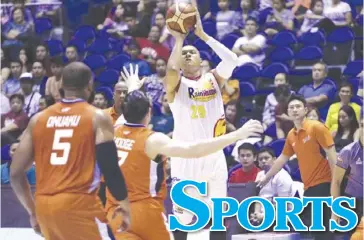  ?? PBA ?? Rain or Shine Elasto Painters center Norbert Torres makes a shot against Meralco Bolts. Painters won in overtime 106-99 during their 2018 PBA Commission­er’s Cup game on Sunday, June 24.