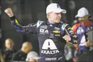  ?? John Raoux / Associated Press ?? In this Feb. 13 file photo, William Byron celebrates in Victory Lane after winning the second of two NASCAR Daytona 500 qualifying auto races at Daytona Internatio­nal Speedway in Daytona Beach, Fla. Byron won NASCAR’s iRacing event at virtual Dover Internatio­nal Speedway.