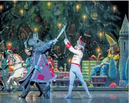  ?? Michael Watson, provided by Colorado Ballet ?? Characters square off in “The Nutcracker.” The dancers here are Joshua Allenback and Jeremy Studinski.