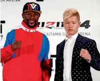 ?? Reuters ?? Floyd Mayweather poses with his opponent Tenshin Nasukawa during a news conference in Tokyo on Monday. —