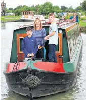  ?? ?? Thorough handover procedures definitely allow for a better boating holiday experience. In this photo, a happy family returns to the Foxhangers wharf after a week’s cruise on the K&A.