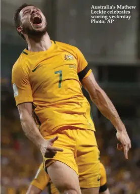  ??  ?? Australia's Mathew Leckie celebrates scoring yesterday Photo: AP