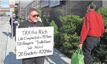  ?? DERIK HOLTMANN, BELLEVILLE NEWS-DEMOCRAT, VIA AP ?? James Hodgkinson protests outside the U.S. Post Office on April 17, 2012, in Belleville, Ill. The suspect in the Virginia shooting that injured Rep. Steve Scalise, R-La., was killed by police.