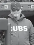  ?? APJOHN MINCHILLO ?? Chicago Cubs Manager Joe Maddon didn’t agree with the umpires’ decision Friday, a game some said shouldn’t have been played.